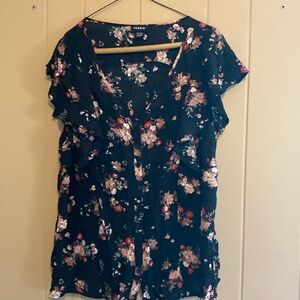 Ladies size large torrid black top with flowers